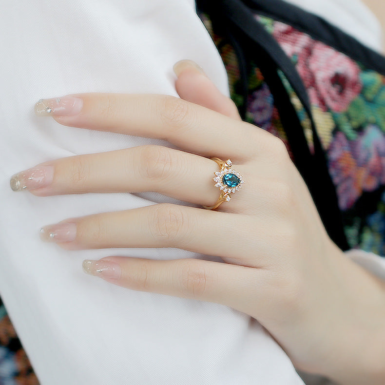 Lunar Halo Blue Topaz Ring