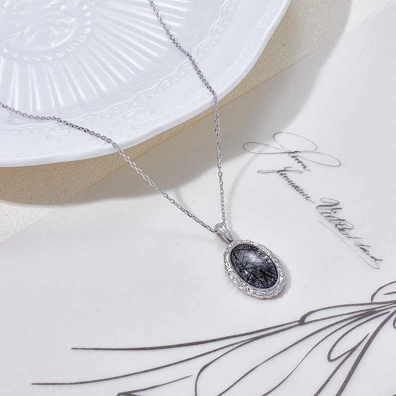 Pendentif ovale vintage en quartz rutile