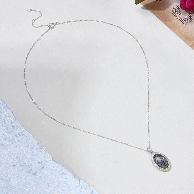 Pendentif ovale vintage en quartz rutile