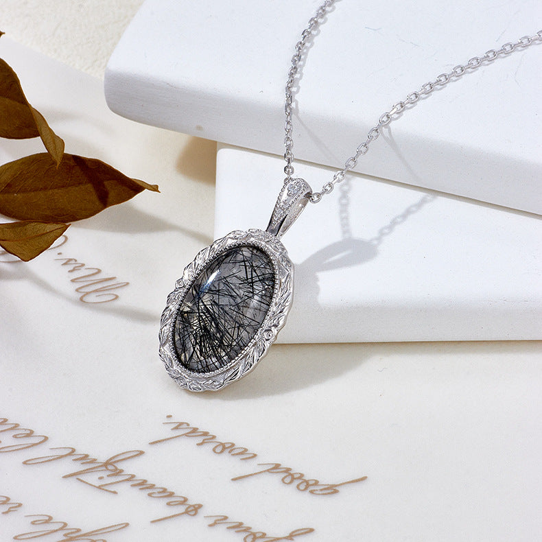 Pendentif ovale vintage en quartz rutile