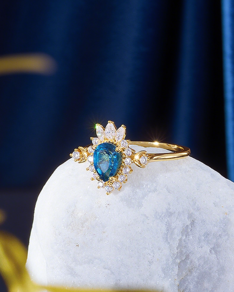 Lunar Halo Blue Topaz Ring