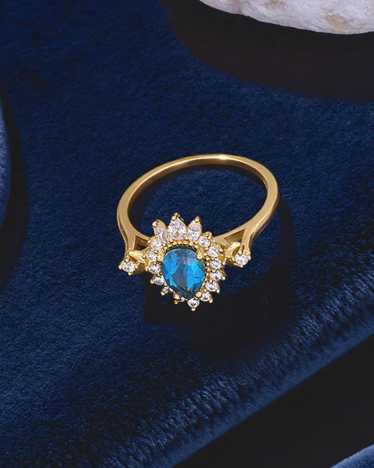 Lunar Halo Blue Topaz Ring