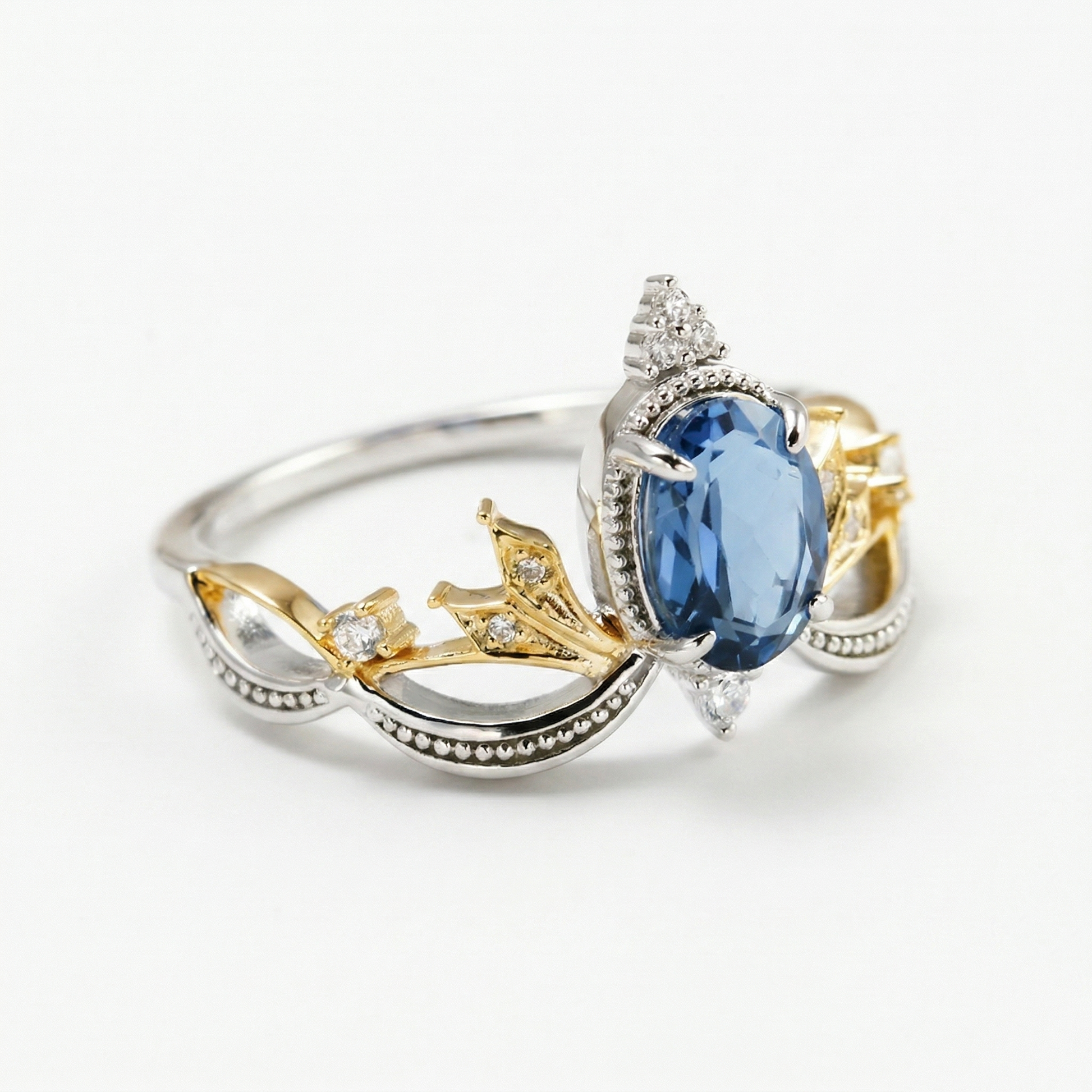 Anillo de Corona Celestial con Topacio Azul Londres