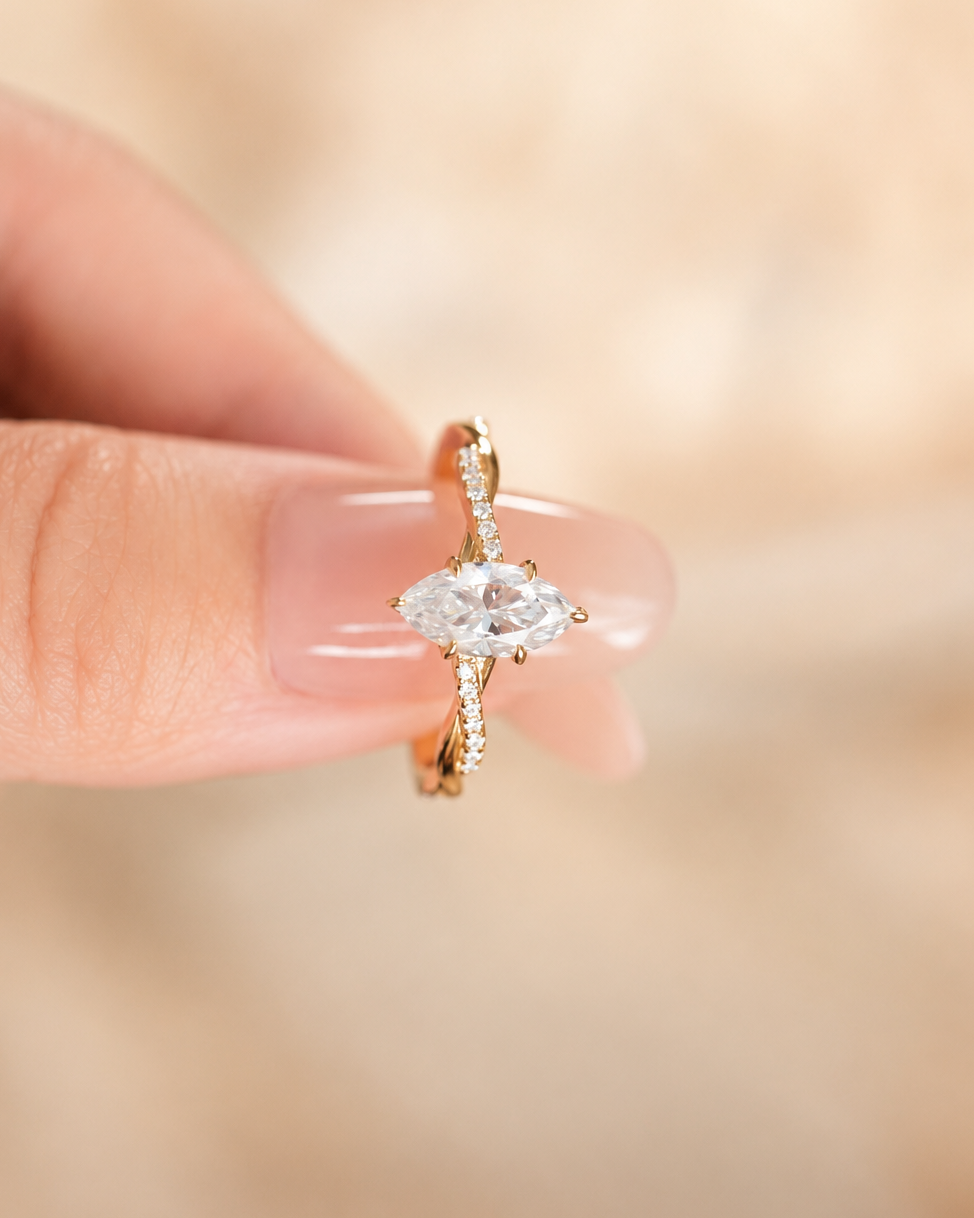 Elegant Marquise-Cut Moissanite Twist Ring