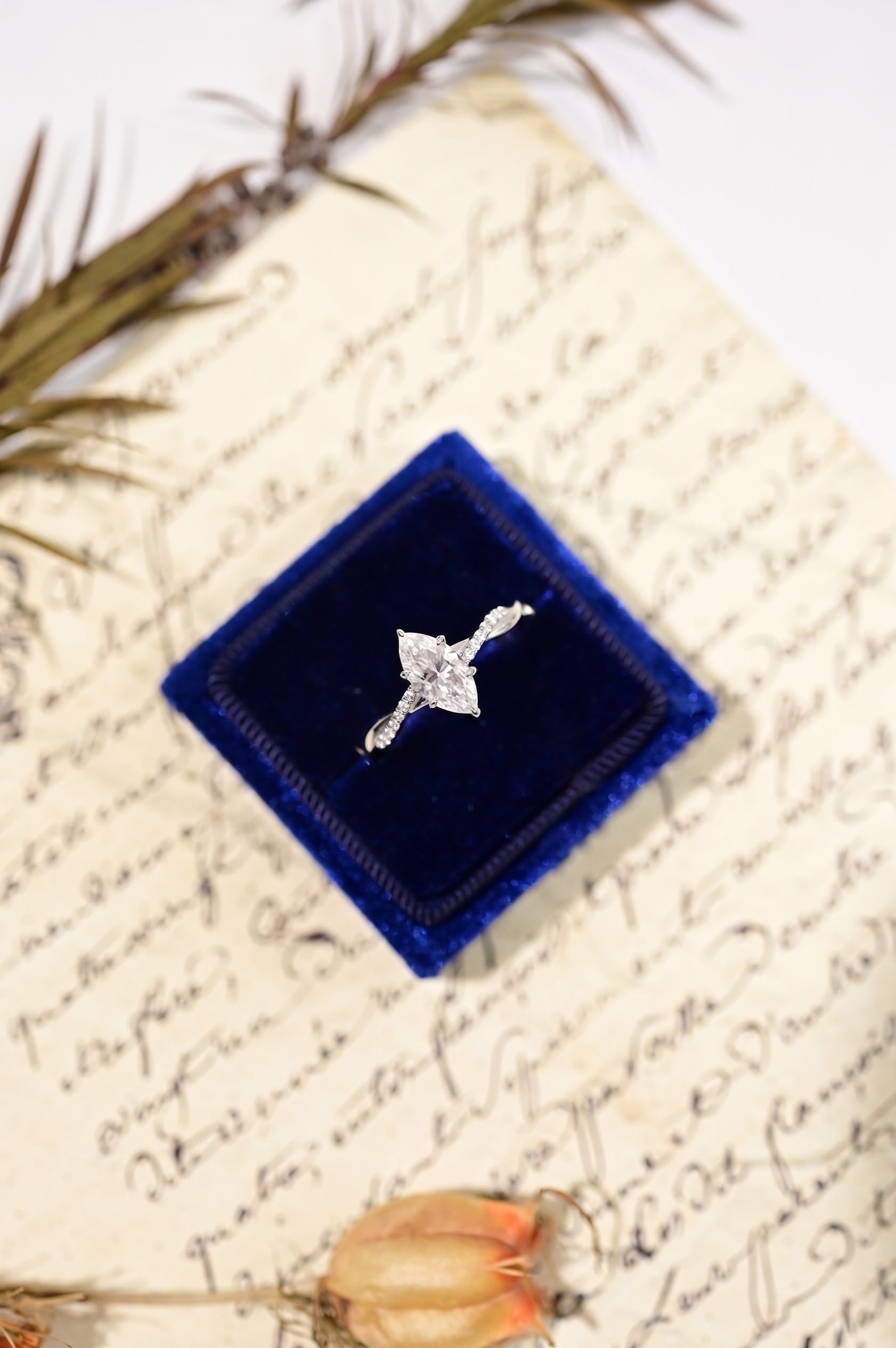 Elegant Marquise-Cut Moissanite Twist Ring
