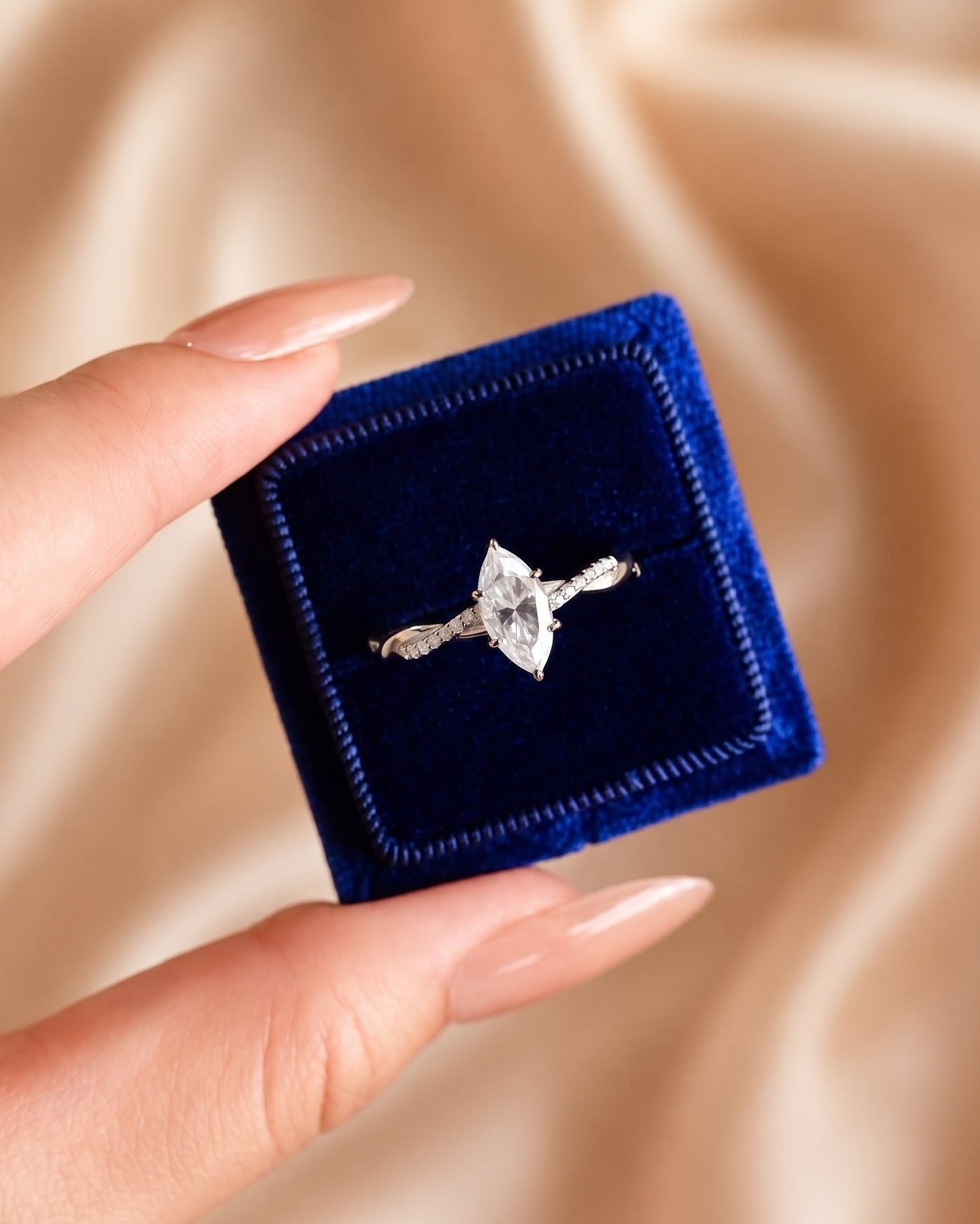 Elegant Marquise-Cut Moissanite Twist Ring