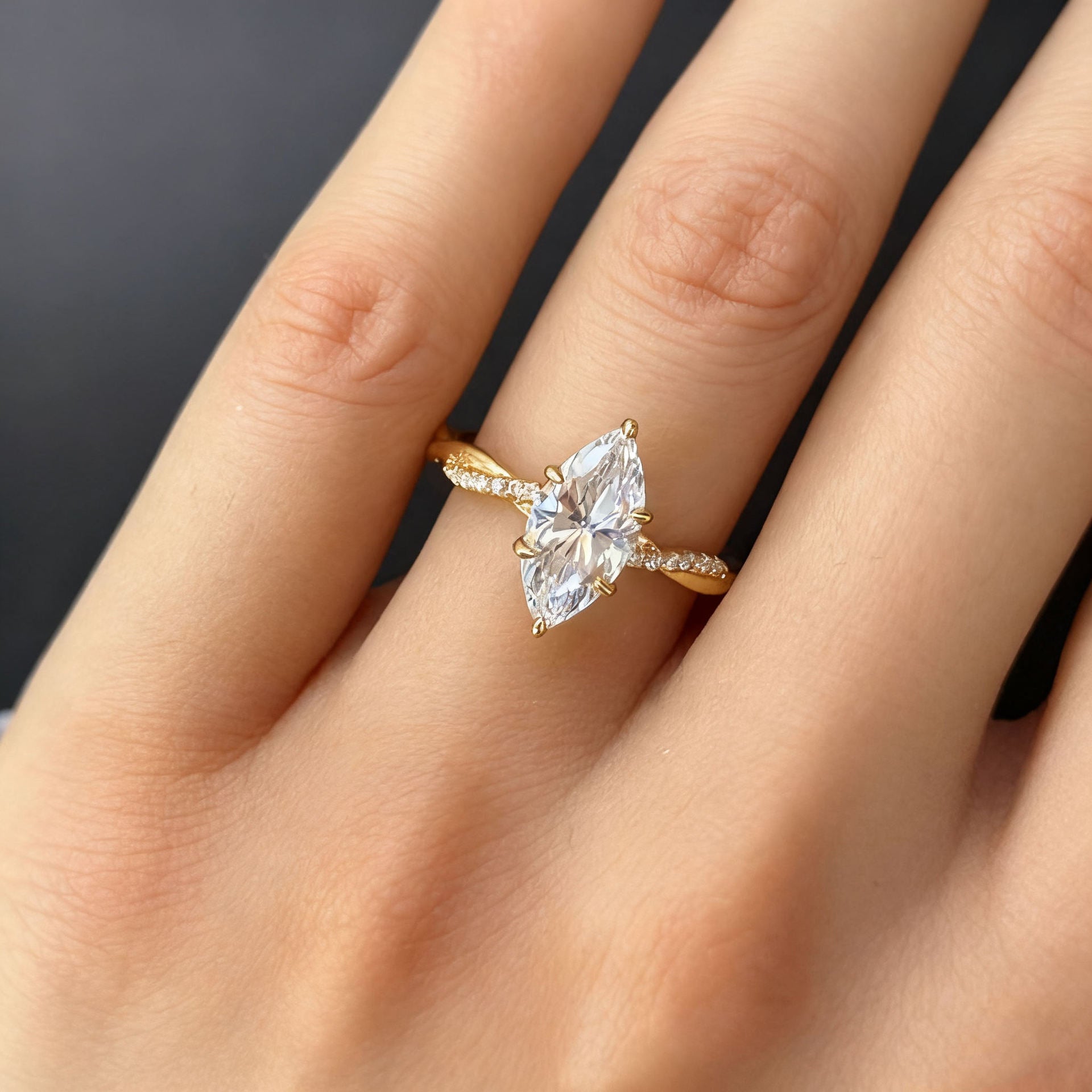 Elegant Marquise-Cut Moissanite Twist Ring